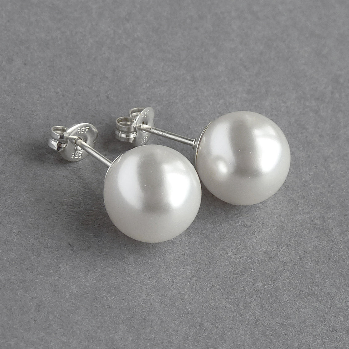 Chunky white pearl stud earrings
