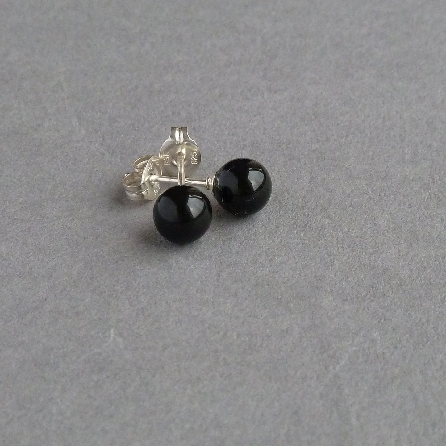 round black stud earrings