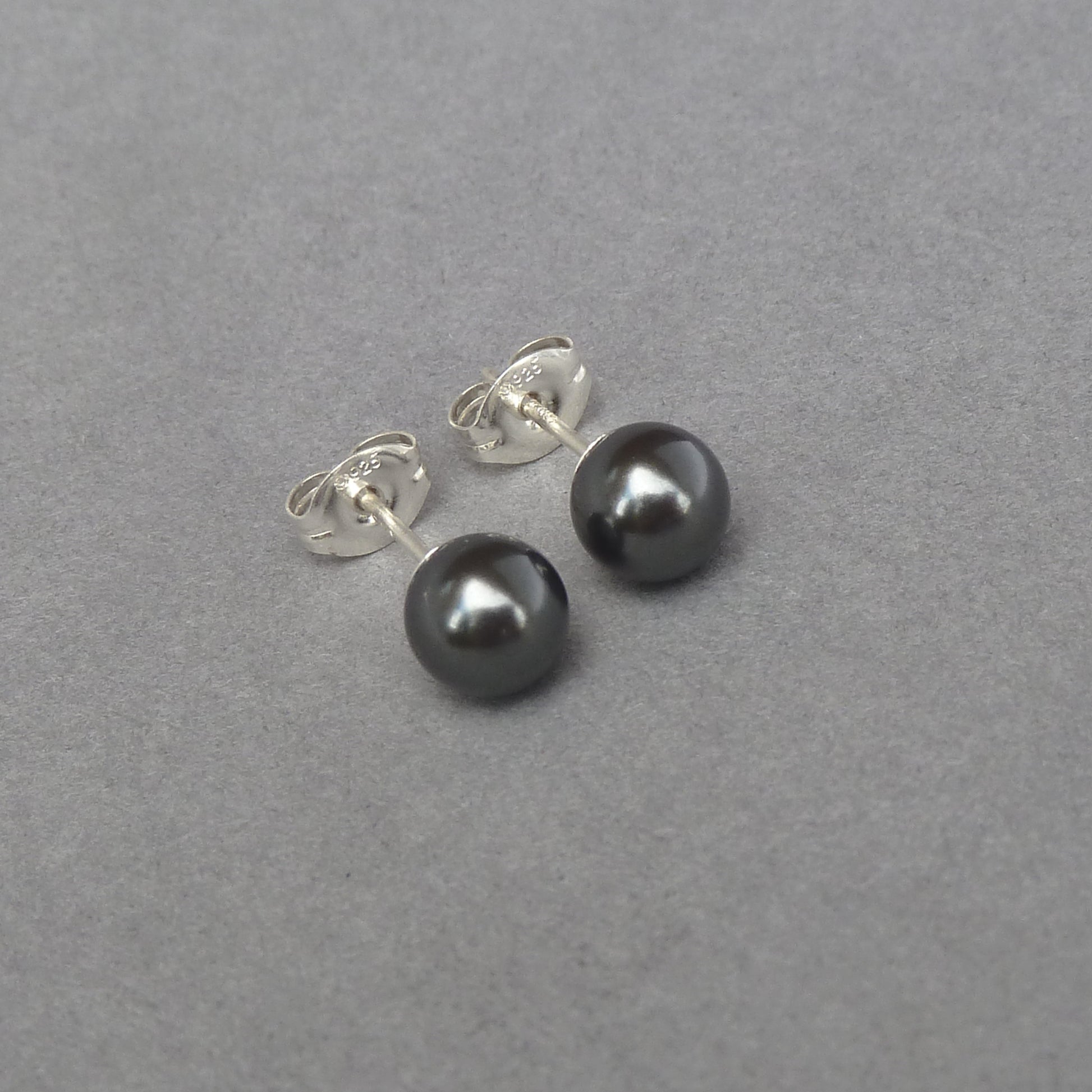Small black pearl studs
