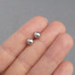 Small silver grey pearl stud earrings