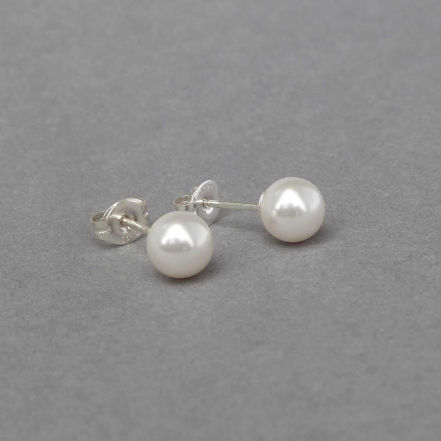Small white pearl stud earrings